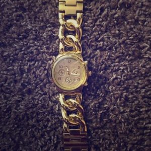 Michael kors gold watch. Brand new never worn.